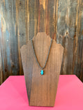 Navajo pearl necklace with silver/turquoise pendant