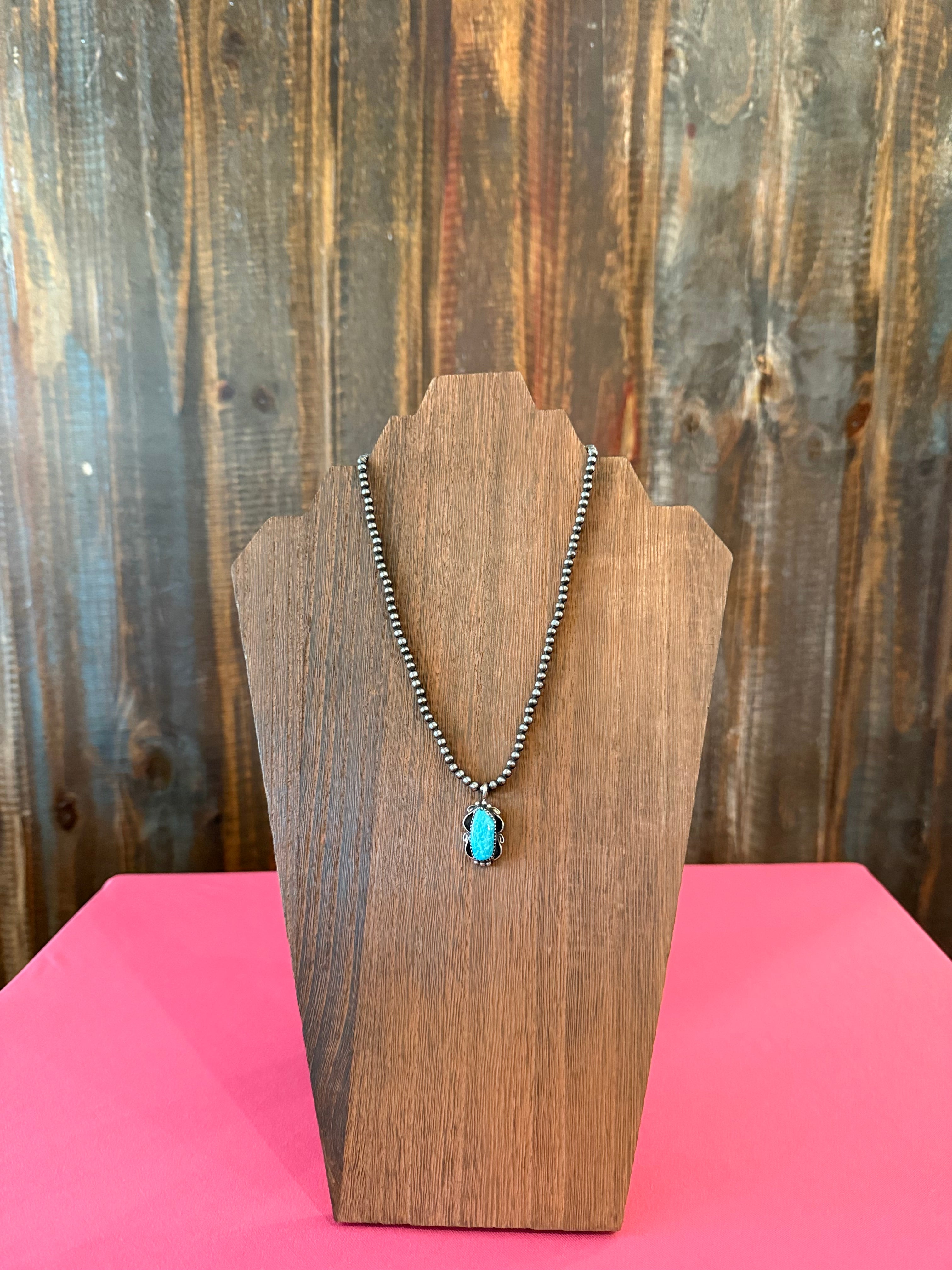 Navajo pearl necklace with silver/turquoise pendant