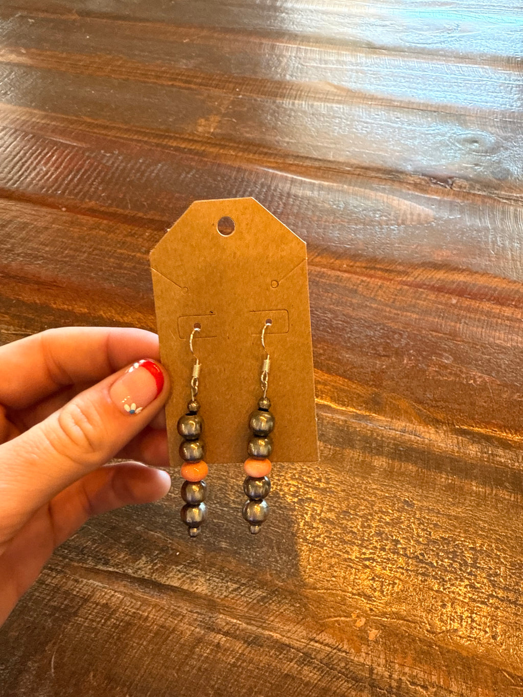 Navajo pearl and pink conch earrings