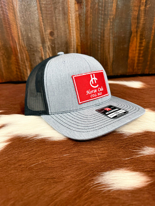 Gray and black Red-patch HC trucker cap